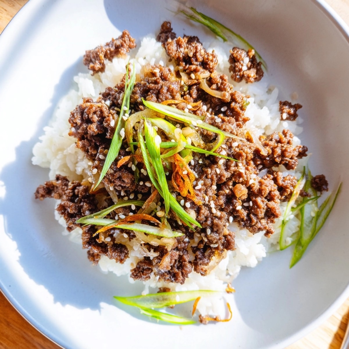 Close-up of flavorful ground beef bulgogi simmering in a pan, ready for dinner tonight.