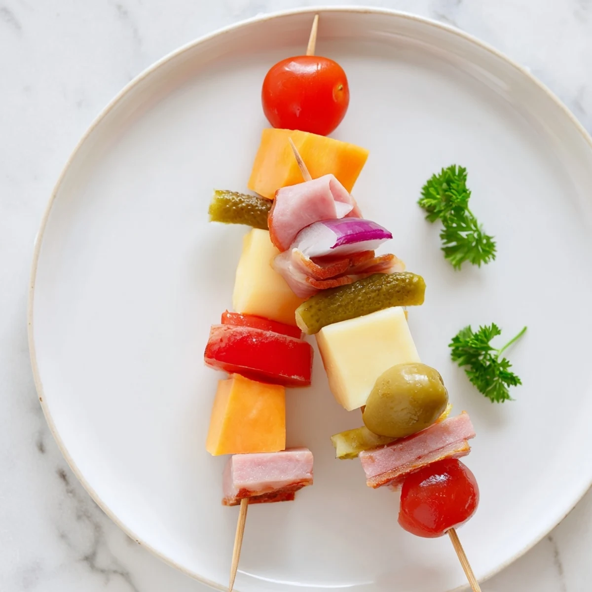 Savory Skewers: meat, cheese, and pickle cubes make a delicious appetizer, perfect for a party.