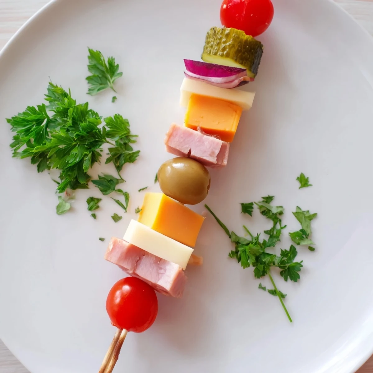 Vibrant Savory Skewers showcasing cubes of meat, cheese, and tangy pickles, ready to serve with olives.