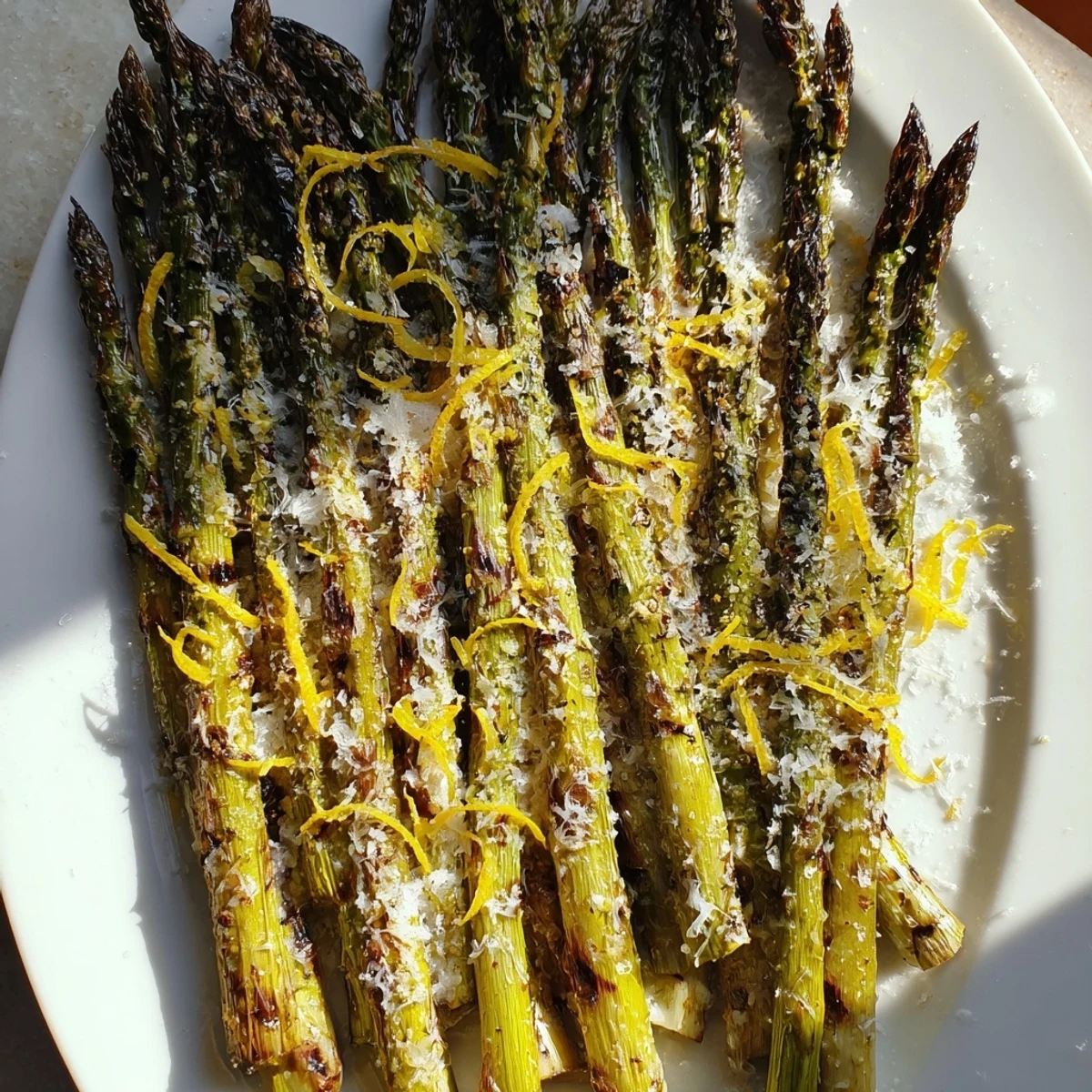 Vibrant plate of Roasted Asparagus with Lemon Zest, ready to serve as a delicious meal accompaniment.