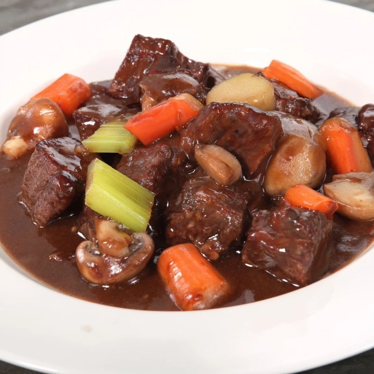 Delicious, slow-cooked braised beef stew, perfect for a cozy, satisfying family meal.