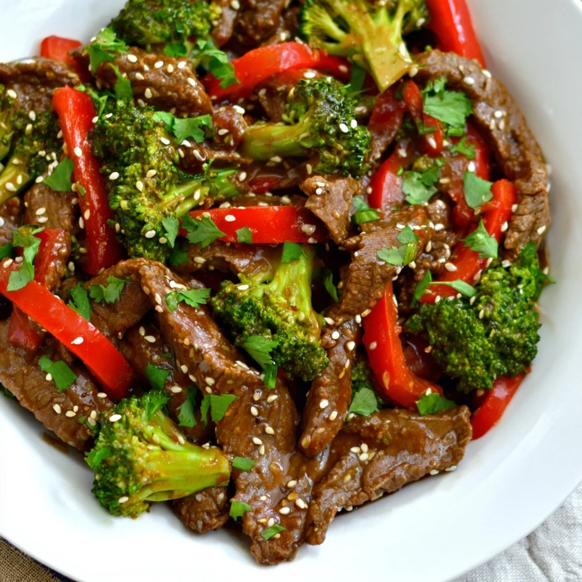 Steaming, tender beef strips and crisp broccoli florets glisten in a spicy, aromatic sauce for this Spicy Beef and Broccoli Stir Fry.  