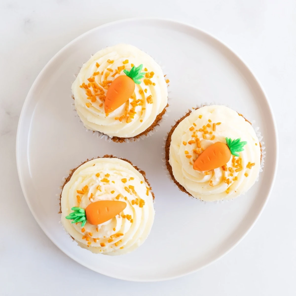 Delicious collection of simple Easter sweets featuring sugar cookies, cheesecake bites, and chocolate bark decorated for spring celebrations