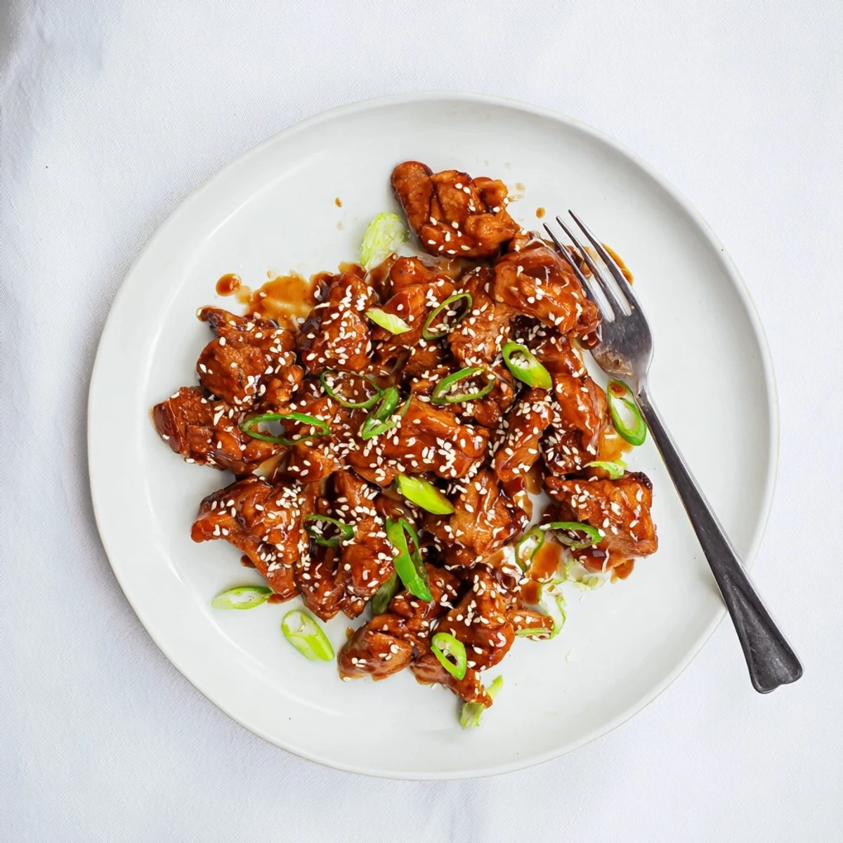 Easy weeknight Crockpot Teriyaki Chicken served over steamed white rice with green onions