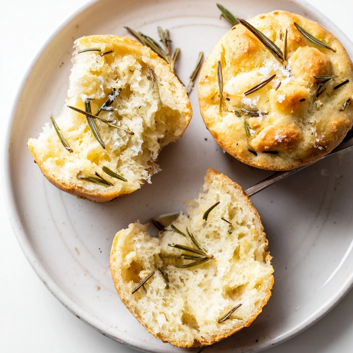 Fresh Garlic Rosemary Focaccia Muffins served warm beside soup and salad