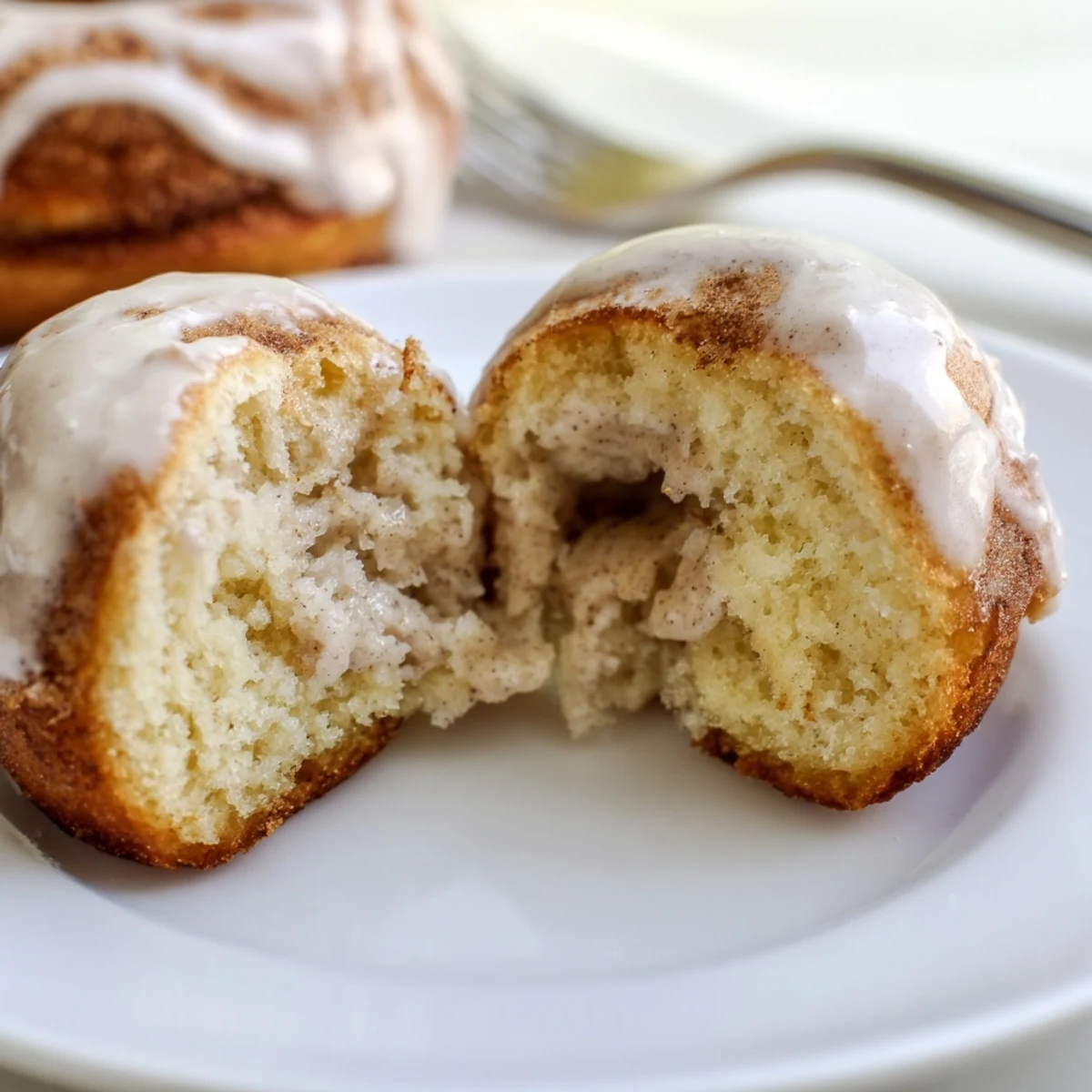 Fresh baked Banana Donuts on a wire rack, warm aroma of cinnamon